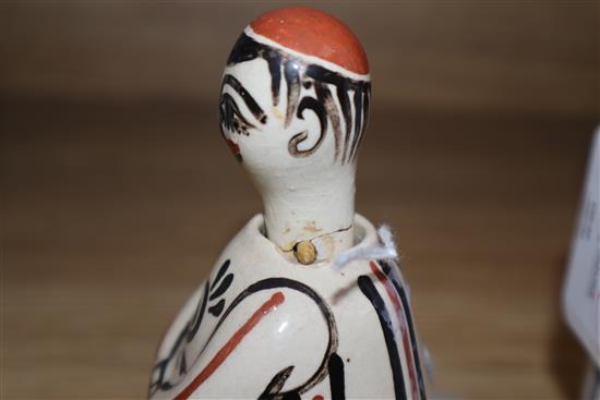 A Rye Pottery Miss Simplicity oil/vinegar bottle and a Bernard Moss Mevagissey Pottery nodding figure (a.f.) tallest 29cm